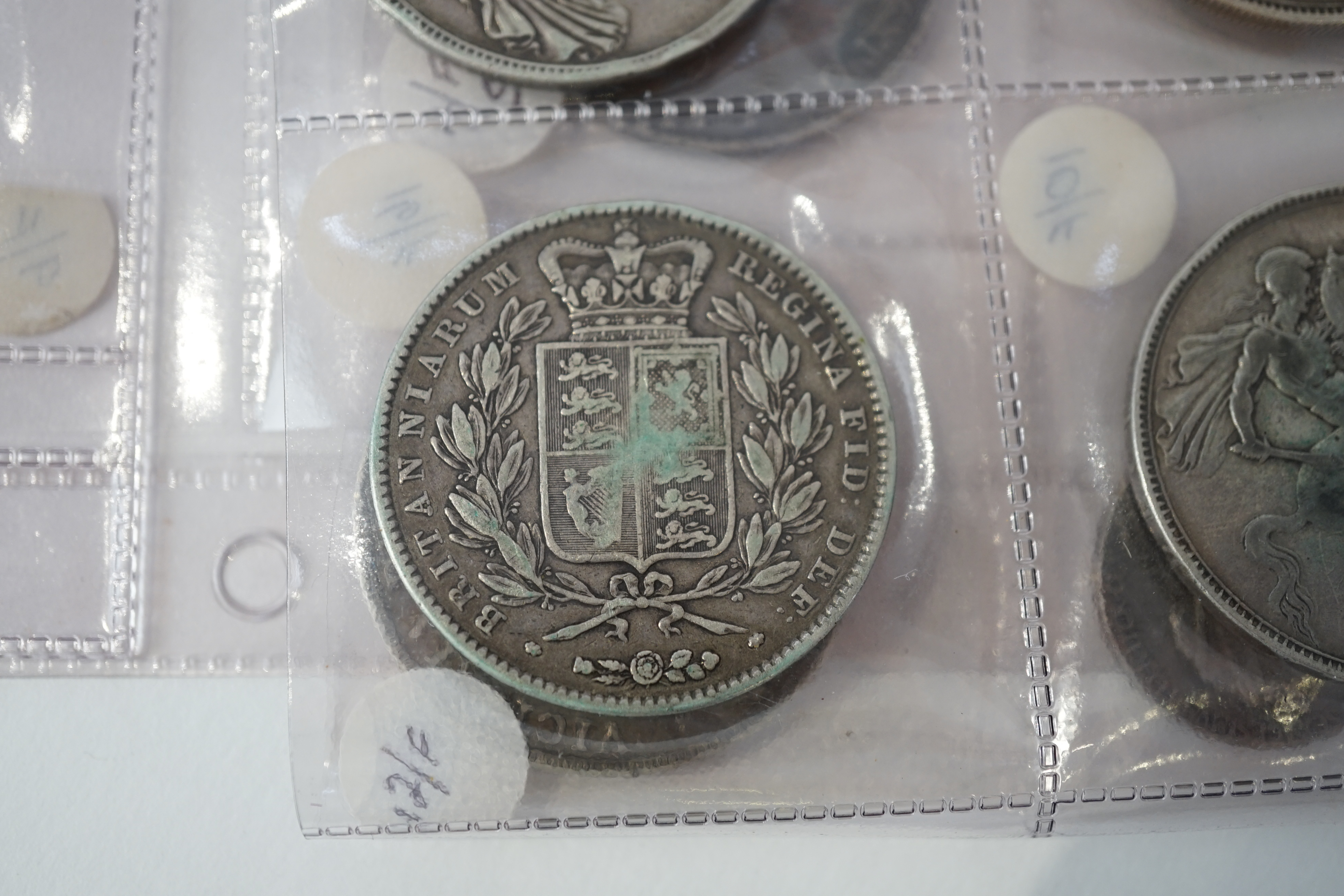 British silver coins, William IV to George VI, comprising five Victoria crowns, 1845, 1889, 1891, 1896 and 1900, a double florin, 1887 (brooch pin demounted), three George V crowns, 1935, George VI crown 1937, three half